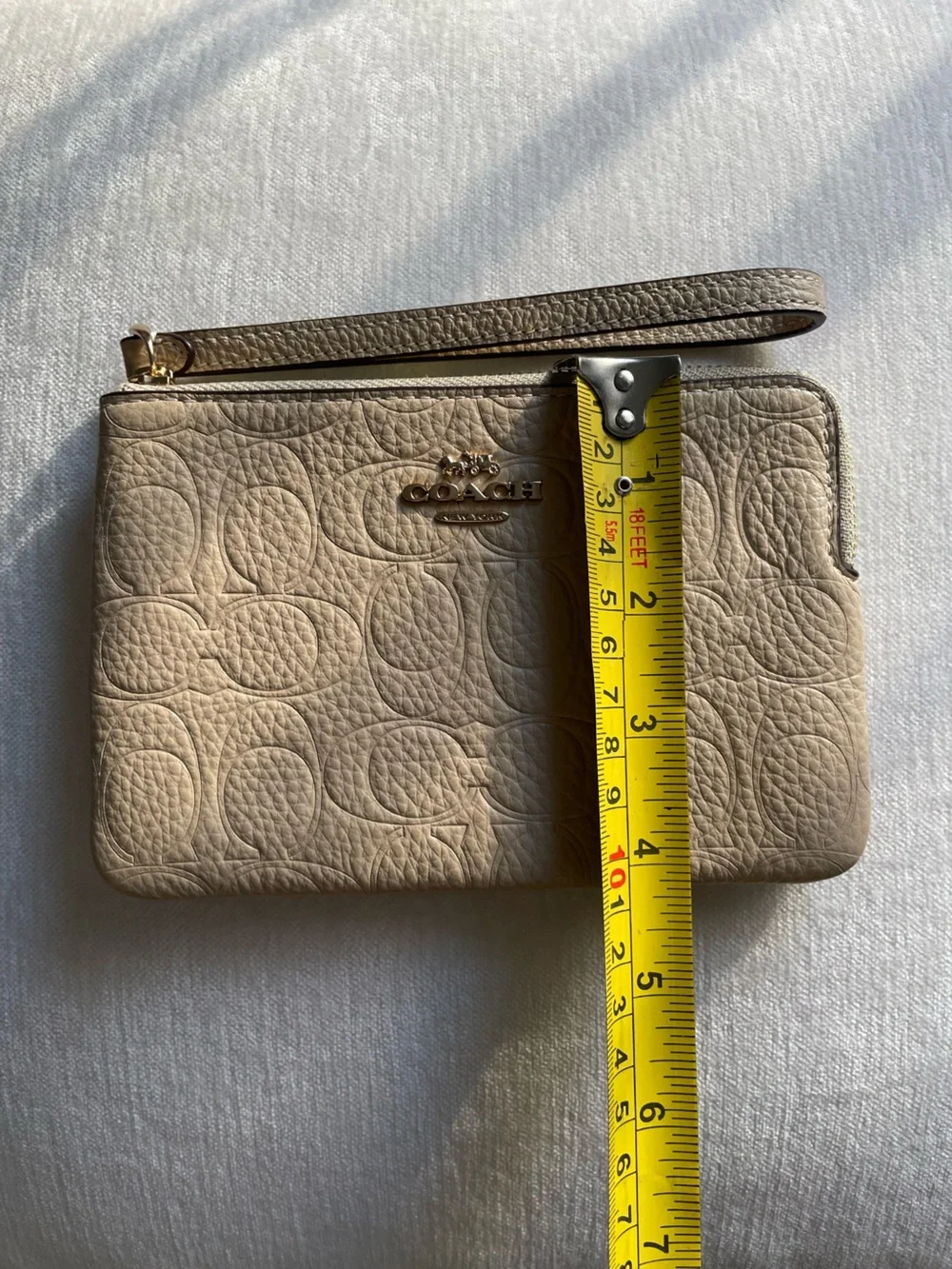 NEW Coach Corner Zip Wristlet Embossed Signature Leather Oat Light Beige